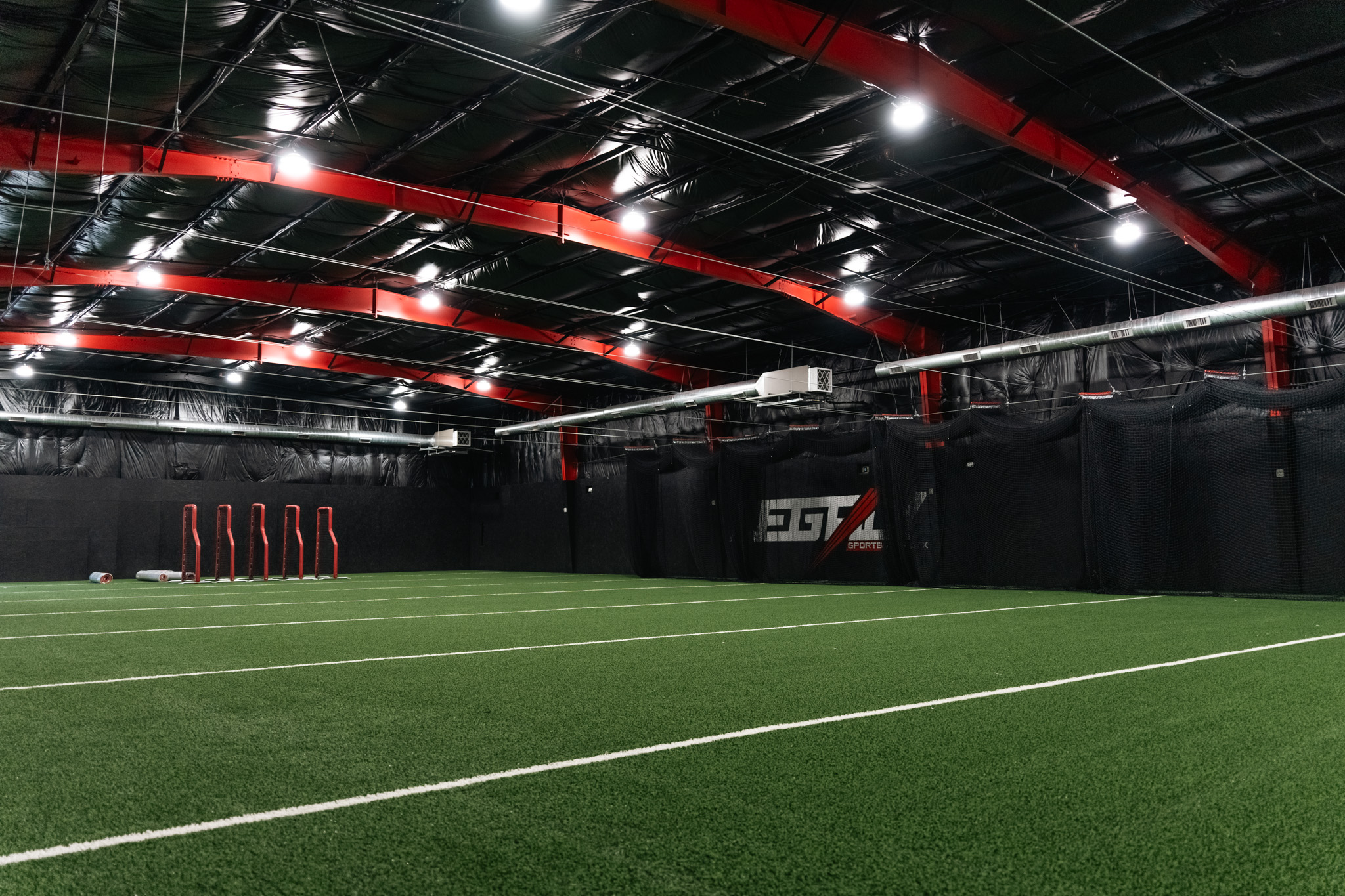 Legacy Sports Complex Canton – state-of-the-art indoor turf field with athletes training