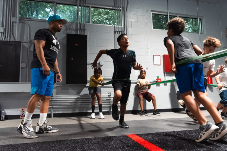 Legacy Sports Complex Lawrenceville – state-of-the-art indoor turf field with athletes training